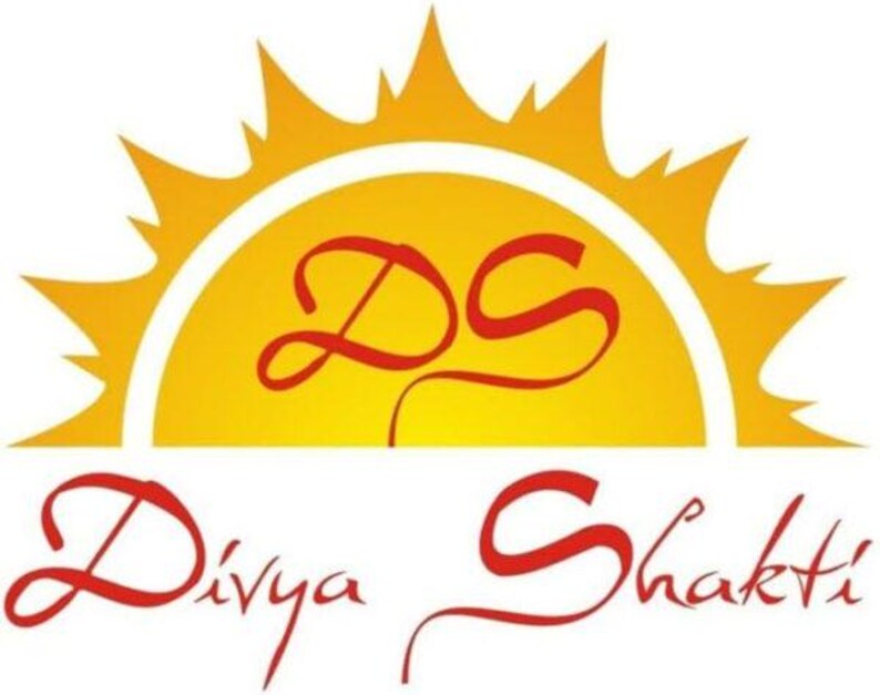 May include: A graphic logo featuring a stylised yellow sun with sharp rays. Centred on the sun are the red letters DS in a cursive font. Below the sun, the text Divya Shakti is written in a matching red cursive script on a white background.