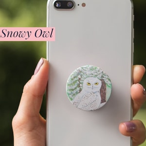 Snowy Owl - Phone Grip featuring aWhite Owl with Orange Eyes Overlooking the Winter Forest - Stand - Unique - Stylish - Original Artwork