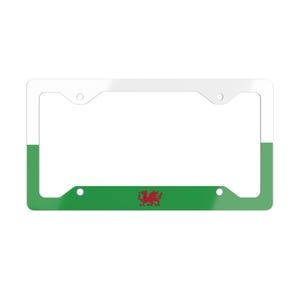 May include: White and green license plate frame with a red dragon in the center. The frame is made of metal and has a white border.