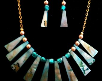 Symmetry and Style. Handmade Necklace and Earring Set. Colors of Sea green and Champagne. Elongated Trapezoid Shell.