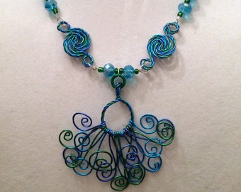 Art Nouveau. Handmade Necklace and Earring Set. Blue, Green and Aqua Wire Swirled and Curled by Hand. Glass Beads in Aqua and Green.