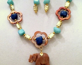 Handmade Necklace and Earring Set. Soapstone Elephant Pendant. Shell Flowers. Teal and Blue Quartzite. Gold Plated Spacer Beads.