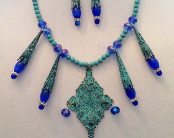 Victorian Beauty. Handmade Necklace and Earring Set. Celadon Filigree Pendant. Celadon Magnesite Beads. Iridescent Faceted Blue Beads