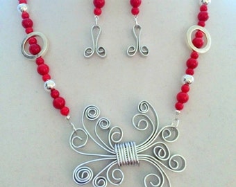 Swirls and Curls. Handmade Necklace and Earring Set. Hand Formed Wire Pendant. Red Bamboo Coral And Silver Plated Beads..