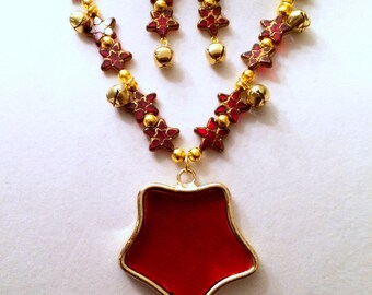 Playful. Bells that jingle. Handmade Necklace and Earring Set. Red Glass Star Pendant framed in gold.