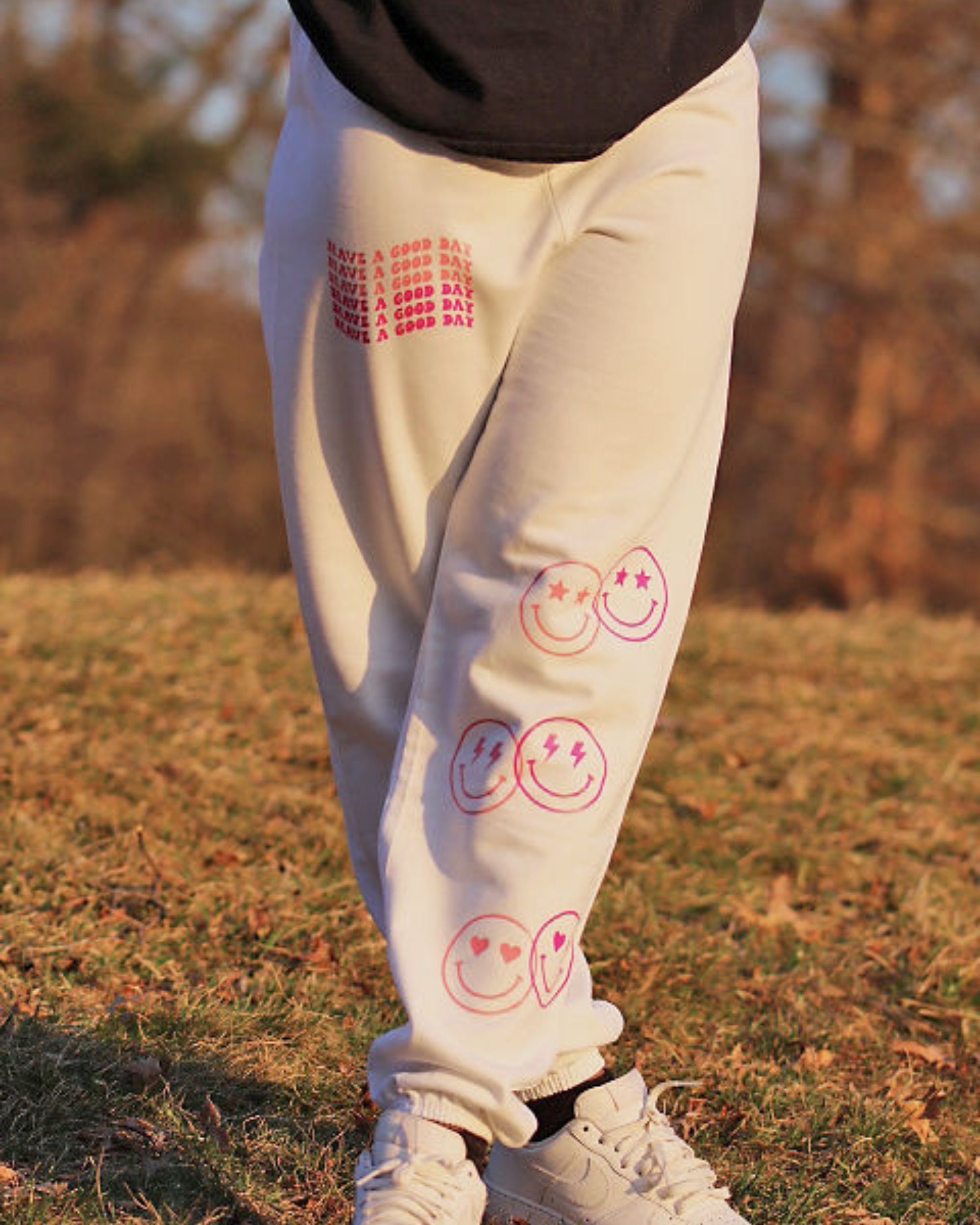 Pellucid Smiley Face Split Sweat Pants