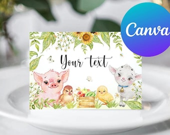 Puede incluir: Una tarjeta de lugar imprimible con una ilustración de acuarela de un cerdo, un cordero, un pollito y una cesta de fruta. El texto "Your text" está escrito en blanco sobre un fondo blanco.