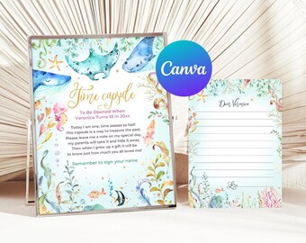 Può includere: Una capsula del tempo blu e verde con un design di cavalluccio marino, stella marina e pesce. Il testo sulla carta recita "Time Capsule To Be Opened When Veronica Turns 18 in 20xx".