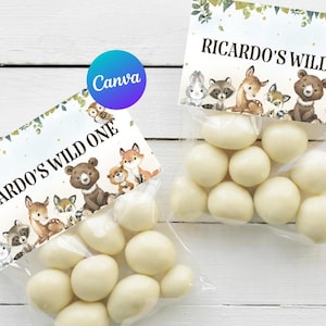 May include: A white favour bag with a green and brown woodland animal themed label that says "Ricardo's Wild One". The bag is filled with white chocolate sweets.