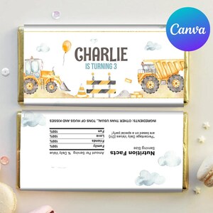 May include: A printable chocolate bar wrapper with a construction theme. The wrapper features a yellow dumper truck, a yellow excavator, and a construction cone. The text on the wrapper says "Charlie is turning 3".
