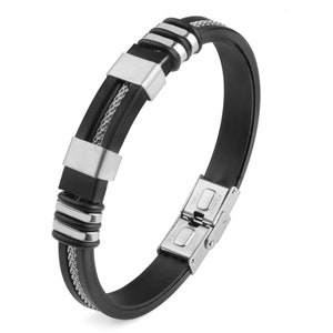 May include: A black silicone bracelet with a silver metal chain and accents. The bracelet has a clasp closure with the words "STAINLESS STEEL" engraved on it.