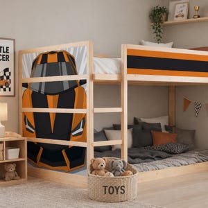 May include: Wooden bunk bed with an orange and black race car design. The bed has a natural wood finish and a lower level with a grey duvet and pillows. A woven basket labelled "TOYS" sits below.