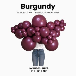 May include: A burgundy balloon garland kit featuring various sizes of balloons including 5 inches, 12 inches, and 18 inches. The text reads Burgundy, Makes a 6ft balloon garland, and Includes sizes 5 inch | 12 inch | 18 inch.