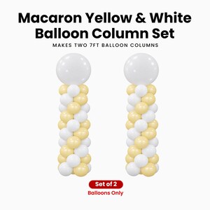 May include: Macaron Yellow & White Balloon Column Set. Makes two 7ft balloon columns. Set of 2 balloons only. Two vertical balloon columns featuring a spiral pattern of alternating pastel yellow and white balloons, each topped with a large white balloon.