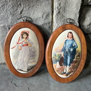 Vintage Oval wooden Pinky Lawrence and Blue Boy wall hangings.
