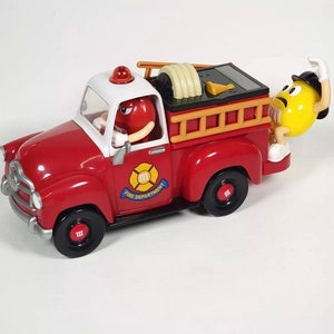 その他 m&m's FIRE TRUCK CANDY DISPENSER M &m Candy Dispenser Fire Truck RARE Red and Blue M&m for
