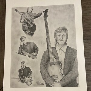 May include: A black and white pencil drawing of four musicians. The musicians are all wearing casual clothing and are holding musical instruments. The drawing is signed "Julie Knittson".
