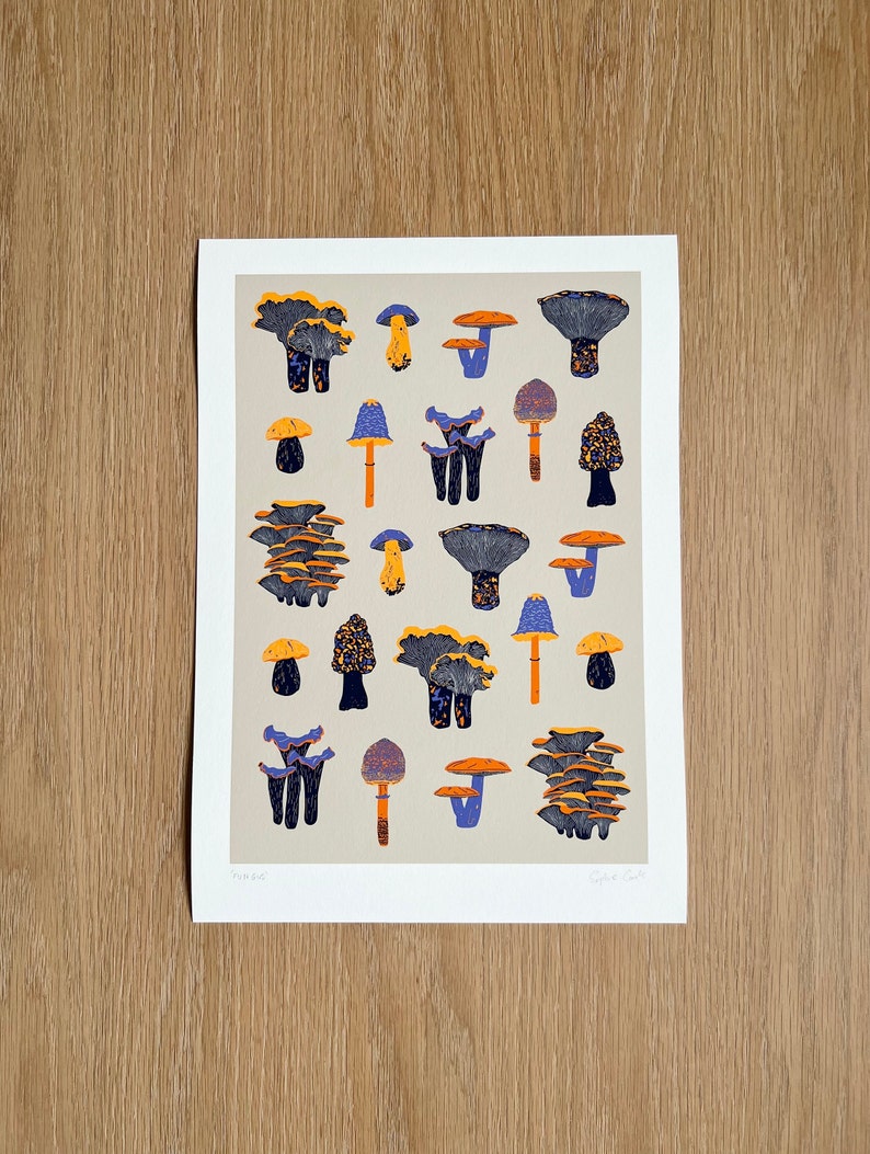 May include: A print of a collection of mushrooms in various shades of blue, purple, orange, and yellow on a beige background.