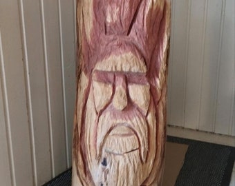 Chainsaw art forest spirit made of red oak