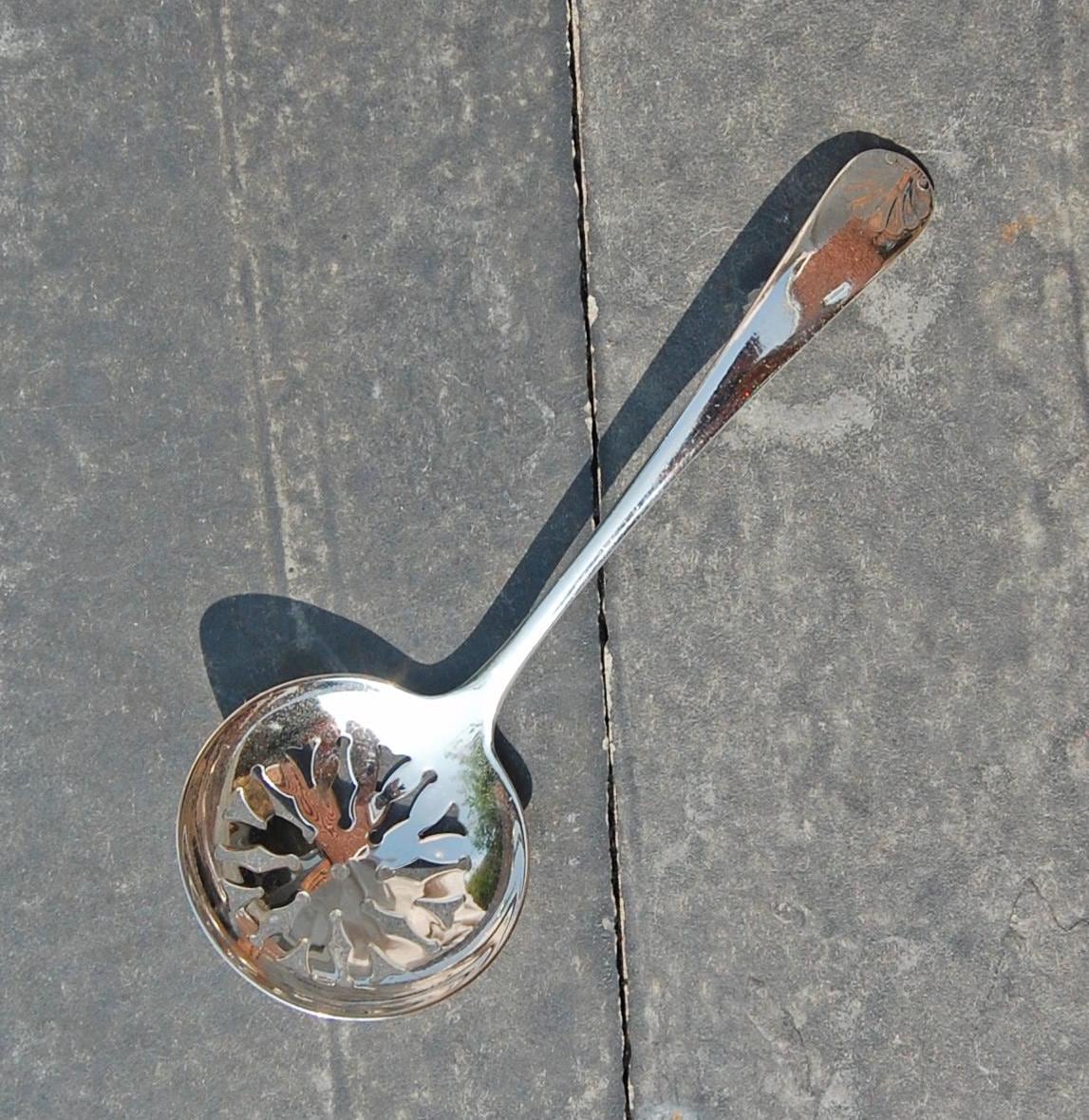 Schöpfkelle mit löchern