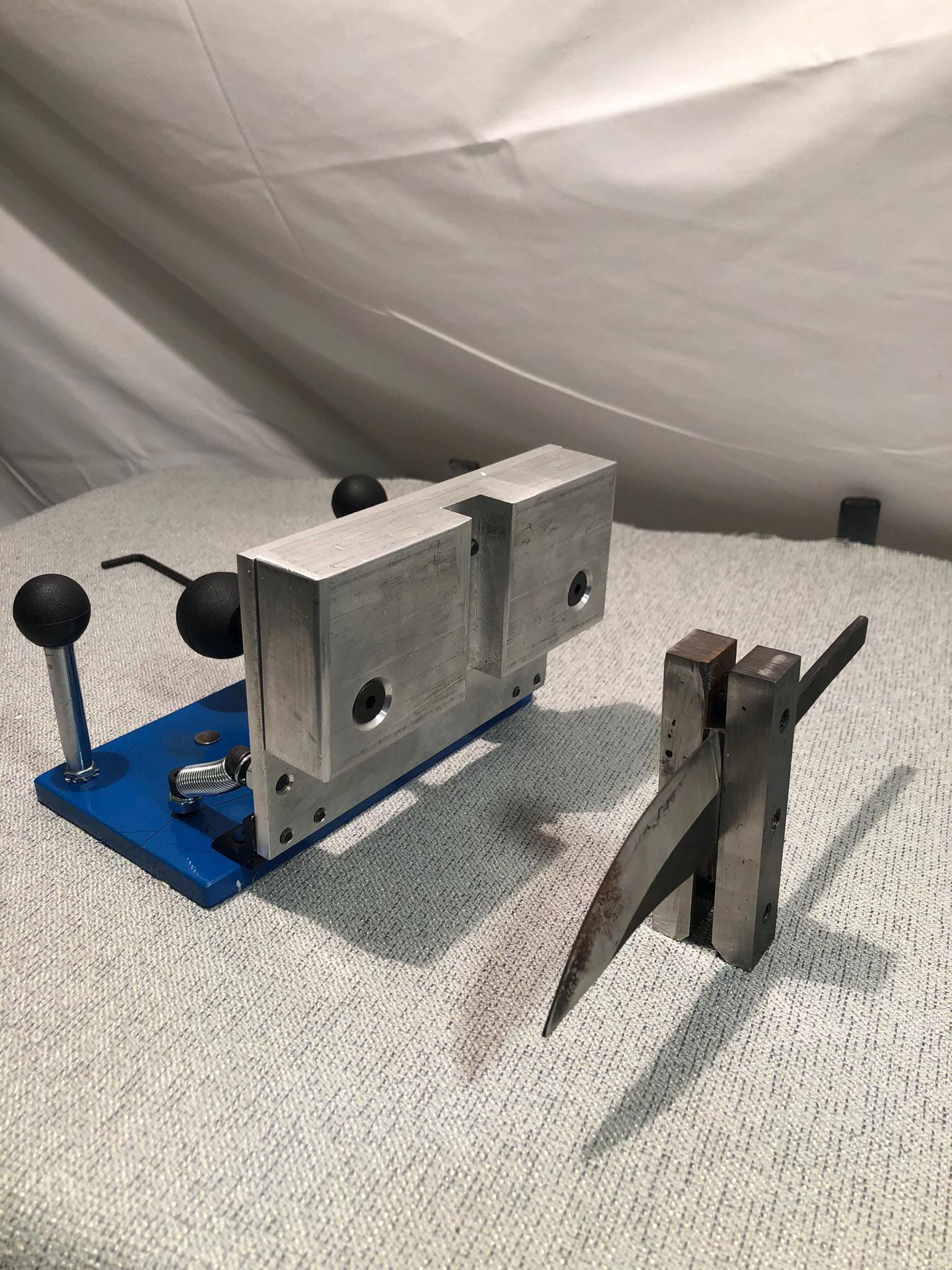 The EzFlip bevel jig, 2x72 grinder accessory's, assisted bevel grinding, adjustable angle, belt knife sharpener jig plunge lines stay inline