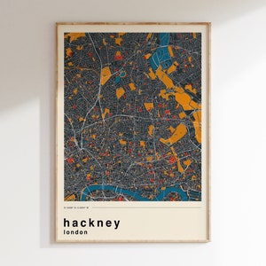 May include: A black and white map of Hackney, London, with a blue river and yellow and red accents. The text "hackney" and "london" is printed below the map.
