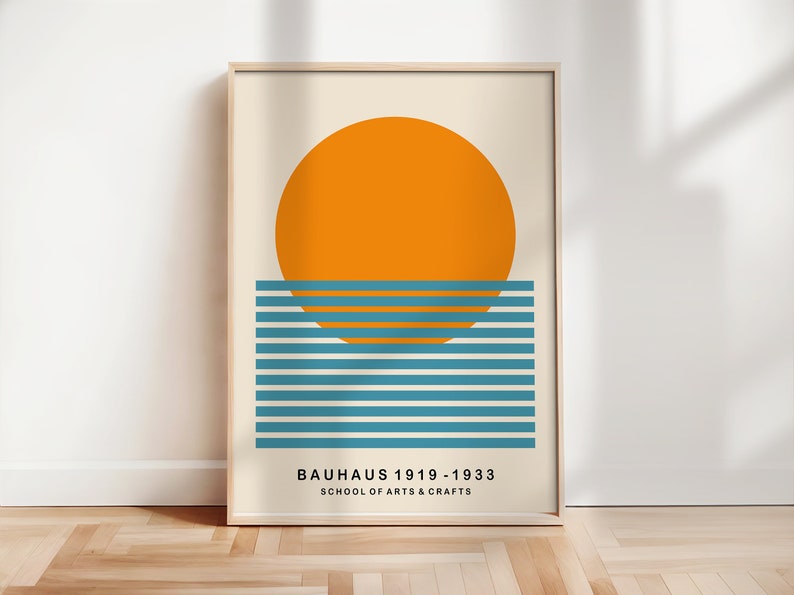 May include: A minimalist poster with a large orange circle representing the sun setting over a series of teal blue horizontal lines. The text "BAUHAUS 1919-1933 SCHOOL OF ARTS & CRAFTS" is at the bottom of the poster.