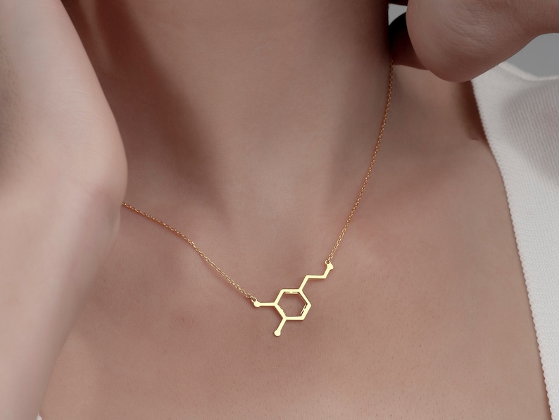 Add a spark of science and style to your look with this elegant Sterling Silver Dopamine Necklace. Featuring a detailed dopamine molecule design, this necklace is perfect for science lovers, students, teachers, or anyone who appreciates the chemistry of motivation and happiness. Crafted in high-quality sterling silver, it makes a meaningful gift for graduation, birthdays, anniversaries, or just because.