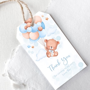 May include: A blue and brown thank you tag with a cartoon bear holding balloons. The tag says "Thank You for coming to my party Love, Ben".