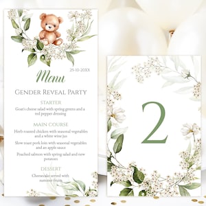 May include: A gender reveal party menu with a floral border and a teddy bear illustration. The menu includes starter, main course, and dessert options. The date is 25-10-20XX. A floral table number card with the number 2.