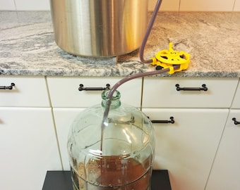 The Siphon Pump, perfect for home brew and wine making.  Sanitary, easy to clean, and sturdy siphon.  Includes 6' silicone tubing