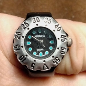 Ring Watch, Gen Ex Ring Watch. Dykarklocka. Ja! Bezelringen spärrar sig också åt vänster. Nytt batteri.