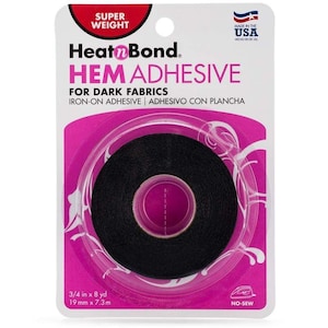 May include: Heat n Bond hem adhesive for dark fabrics. The package is white and pink, with a roll of black adhesive tape visible. The package states the tape is 3/4 in x 8 yd. Made in the USA. The package also states it is iron-on and no-sew.