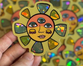 Groovy Holographic Sun Sticker – Trippy Sun Face Vinyl – Psychedelic Weatherproof Sticker for Journals & Gifts