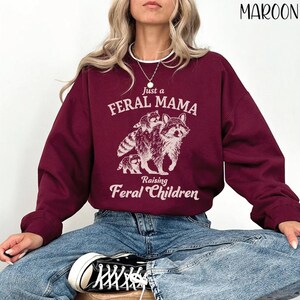 Just a Feral Mama Raising Feral Children Sweatshirt, Funny Mom Hoodie, Raccoon Lover Tee, Wild Mom Life Shirt image 2