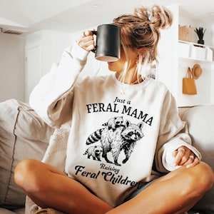 Just a Feral Mama Raising Feral Children Sweatshirt, Funny Mom Hoodie, Raccoon Lover Tee, Wild Mom Life Shirt image 1