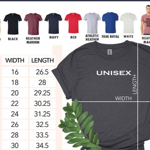 May include: Dark grey unisex t-shirt with the word "UNISEX" in white. The image shows a size chart with width and length measurements in inches. Additional t-shirt colours include black, navy, red, and white.
