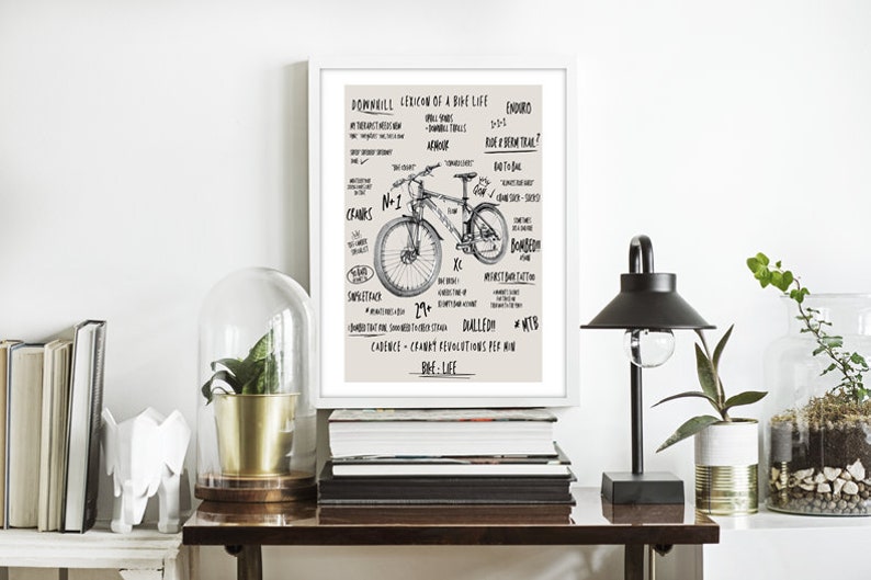 May include: A black and white illustration of a mountain bike with text describing different types of mountain biking, including downhill, enduro, cross country, and more. The text also includes terms like "cadence", "29+", and "MTB".
