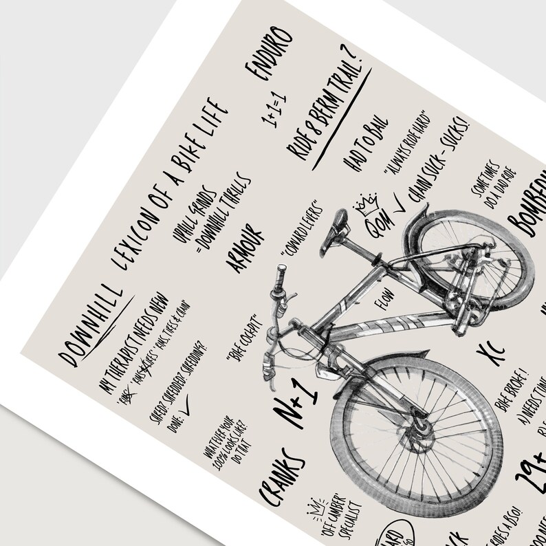 May include: A black and white illustration of a mountain bike with the text "Downhill Lexicon of a Bike Life" and other related terms. The illustration includes details like the bike's components, such as the cranks, armor, and flow.
