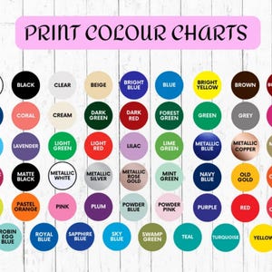 May include: Print color chart with a variety of color swatches in circles. Colors include white, black, red, blue, green, and more. The text "PRINT COLOUR CHARTS" is at the top in a pink banner.