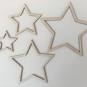 Stjärnkontur av björkplywood: DIY-mobilformer för barnkammare