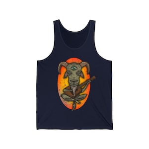 May include: A navy blue tank top with a graphic of a green goat with a third eye playing a guitar. The goat is sitting in a lotus position inside a yellow and orange oval.