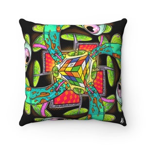 May include: Square throw pillow with a colorful, psychedelic design. The artwork features a Rubik's Cube at the center, surrounded by abstract shapes in green, pink, and orange against a black background. The pillow has a black border.