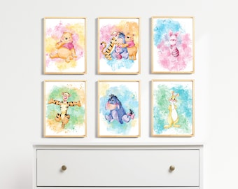 May include: Six framed watercolor prints featuring Winnie the Pooh characters. The prints are in a light wood frame and feature a watercolor background with a light blue, light green, light pink, and yellow color scheme. The characters include Winnie the Pooh, Tigger, Piglet, Eeyore, and Rabbit.