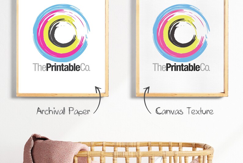 May include: Two framed prints of a colorful circle design with the text "ThePrintableCo." printed below. The print on the left is on archival paper and the print on the right is on canvas texture.