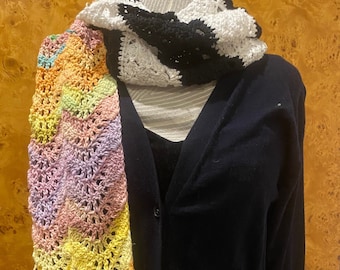 How to crochet Wednesday Addams and Enid in one scarf! Instructions and photo tutorial -classic b&w stripes plus chaotic rainbow ripples