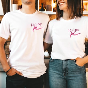 Camiseta HOPE - Outubro Rosa - Liga do Câncer de Mama - laço rosa - #jaimemesseins - #hautlesseins