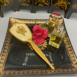 Vintage ornate gold color Nylon hair brush