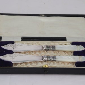 1898 knives in original box vintage, mother of pearl and stainless steel