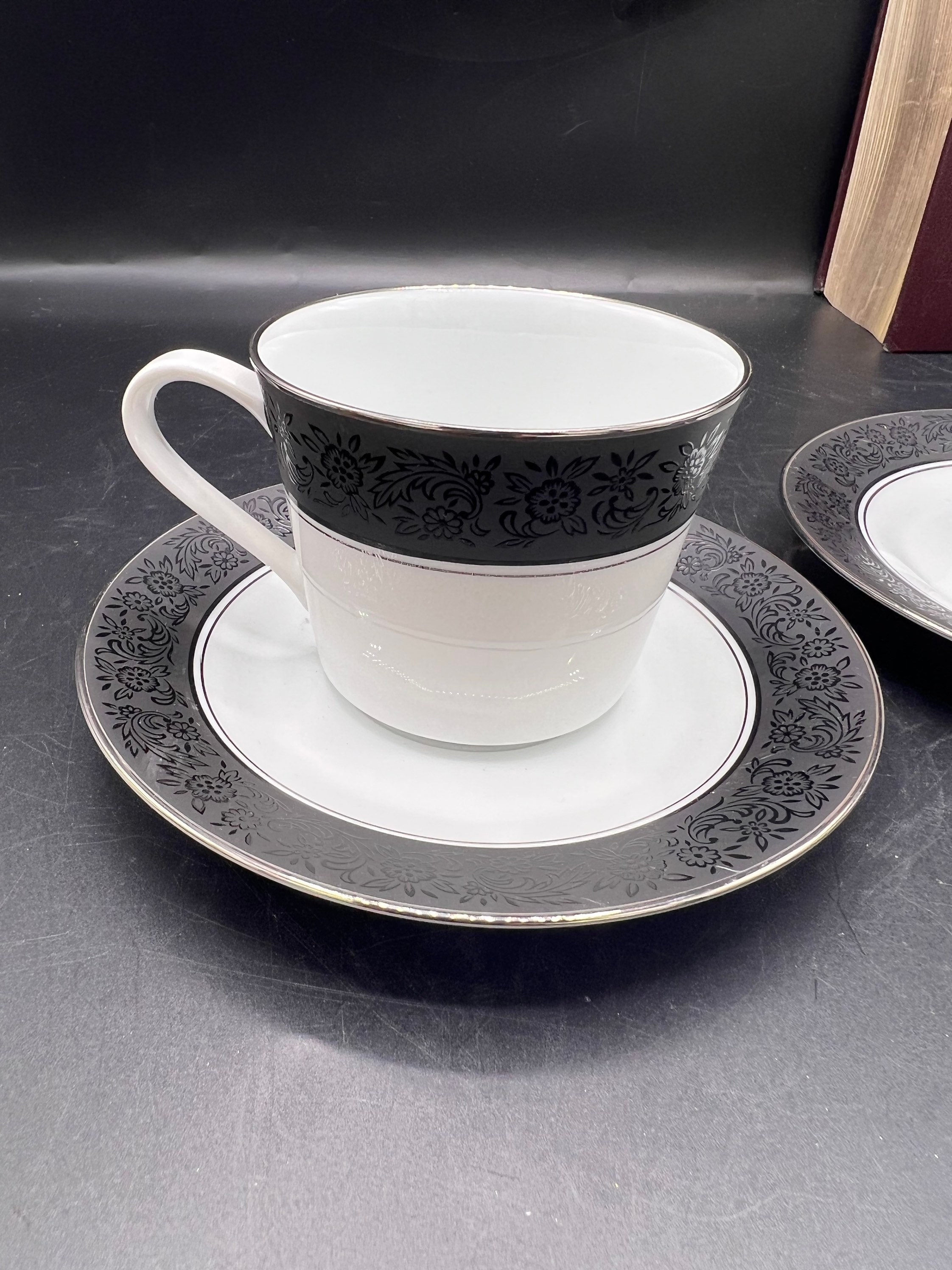 NORITAKE MIRANO Teacups and Saucers - Black Embossed Trim With